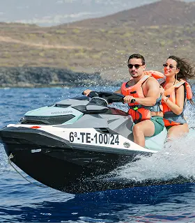 Couple Enjoying a Jet Ski Safari in Las Galletas.