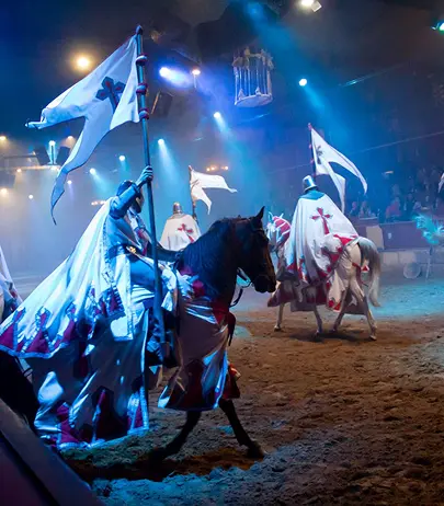 Knights and horses performing at the Medieval Dinner Show at Castillo San Miguel in Tenerife.