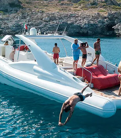 The Opera 60 boat on a whale and dolphin watching cruise off the coast of Tenerife.