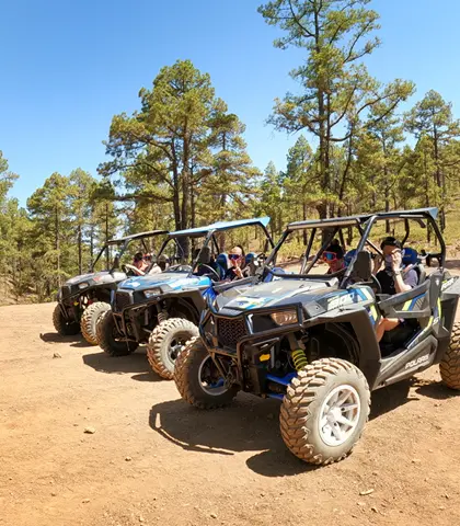 A buggy on a volcanic mountain road during a Teide buggy tour in Tenerife.