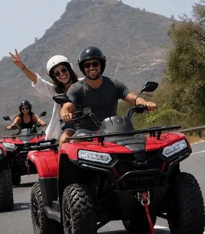 A quad bike on a volcanic mountain road during a Teide quad tour in Tenerife.